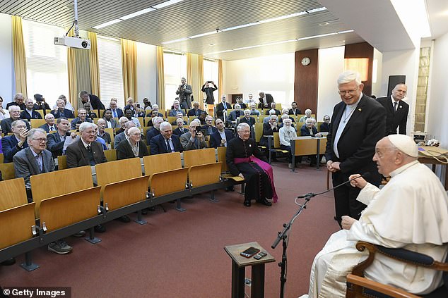 Pope Francis attends a private meeting with Jesuit brothers during a visit to the Collage Saint-Michel, a Jesuit school on September 28, 2024 in Brussels, Belgium