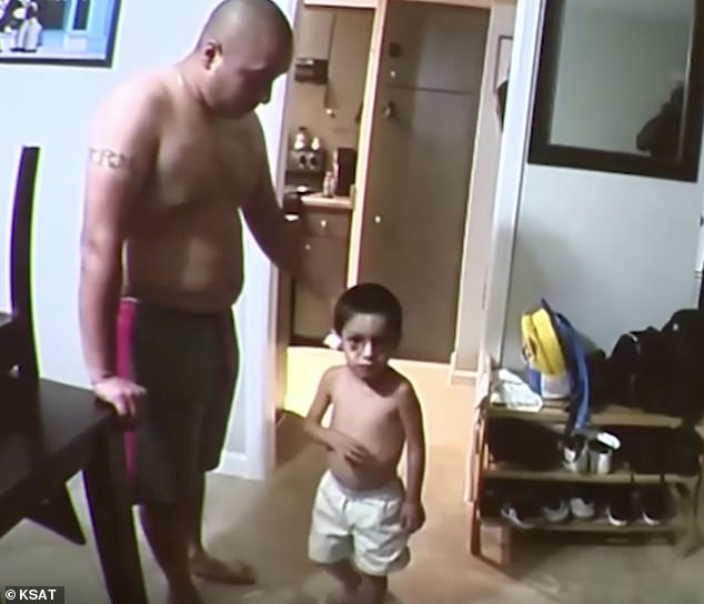 His father Brandon Cevera is seen in police bodycam footage standing next to his child in 2021