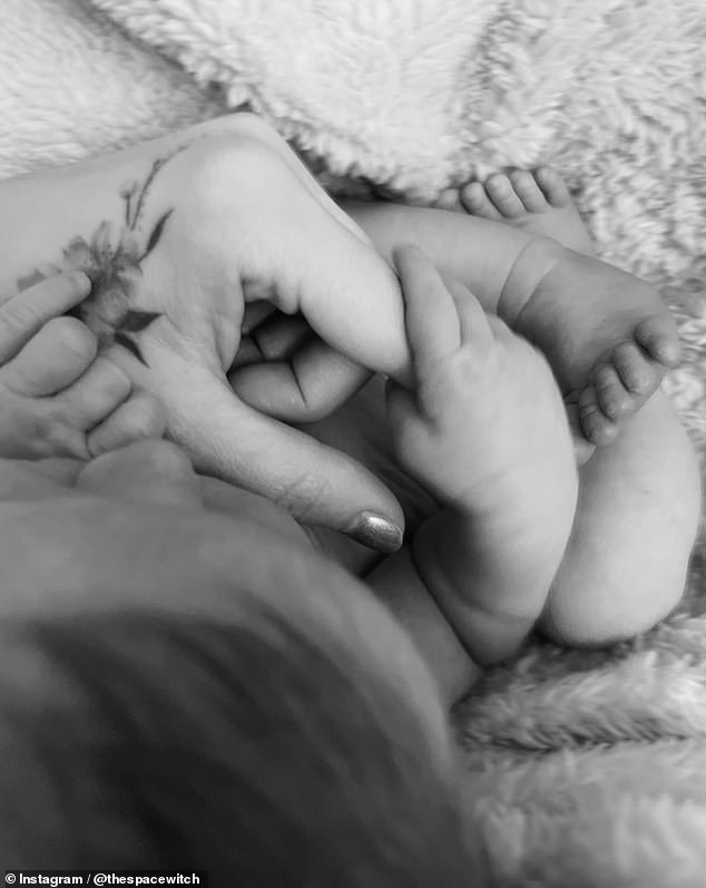 The new mom added, “Welcome to the most beautiful son in the world. We love you more than anything,” along with a photo of her fingers touching her son's hands and feet