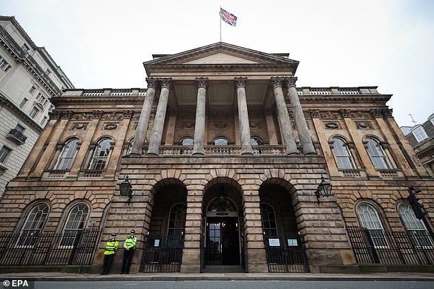 Police officers stand guard outside Liverpool Town Hall on September 10 - the building houses the ongoing Thirlwall investigation into the Lucy Letby case