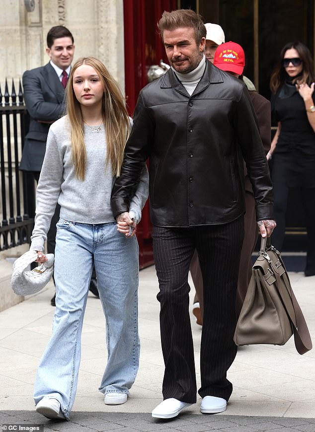 Meanwhile, her leather-clad husband David, 49, held hands with their daughter Harper, 13, as they left their swanky hotel