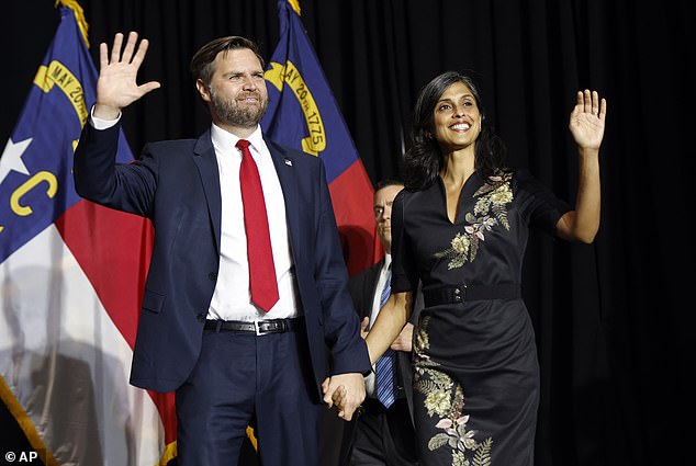 Republican vice presidential candidate Sen. Vance, R-Ohio, walks on stage with his wife Usha Vance during a campaign event in Charlotte, N.C., Monday, September 23, 2024