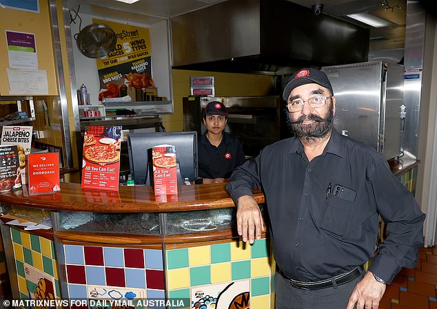 Franchise owner Santnam Ahuia (pictured), who took over the pizzeria with his wife Jenny in 2006, told Daily Mail Australia he wanted to keep the retro relic as it was in its heyday