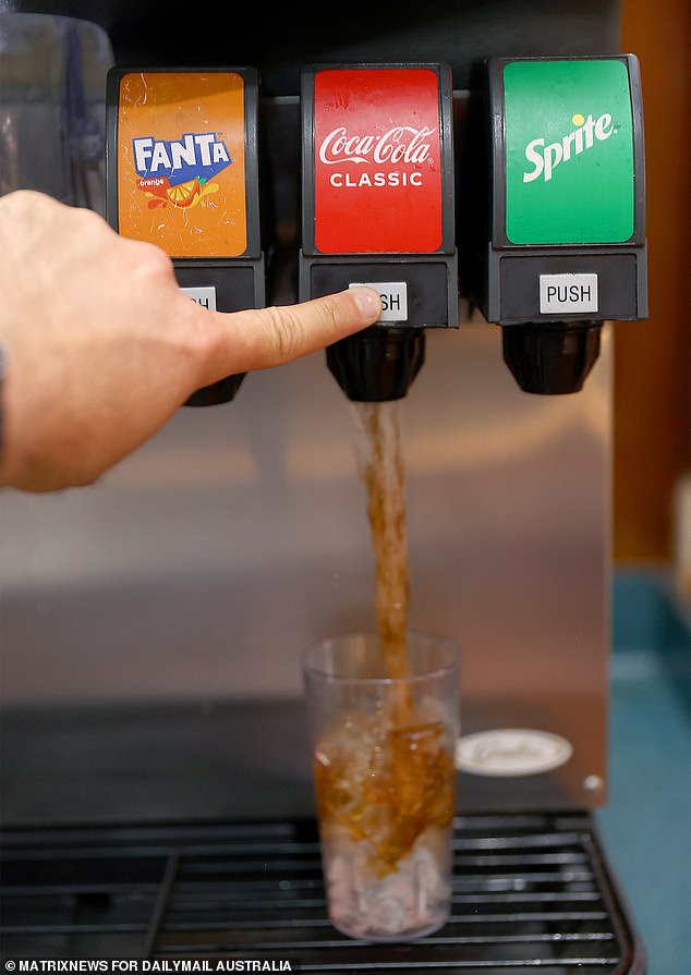 Pizza Hut's old-fashioned soft drink machine is pictured in action