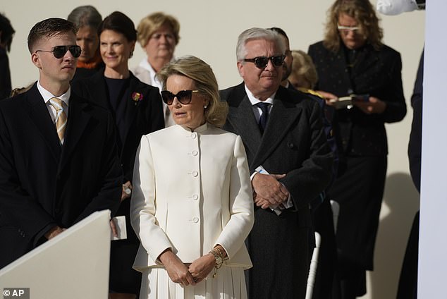 Mathilde wore an all-white ensemble, similar to the snow-white suit she wore Friday on the second day of the Pope's weekend visit to Belgium