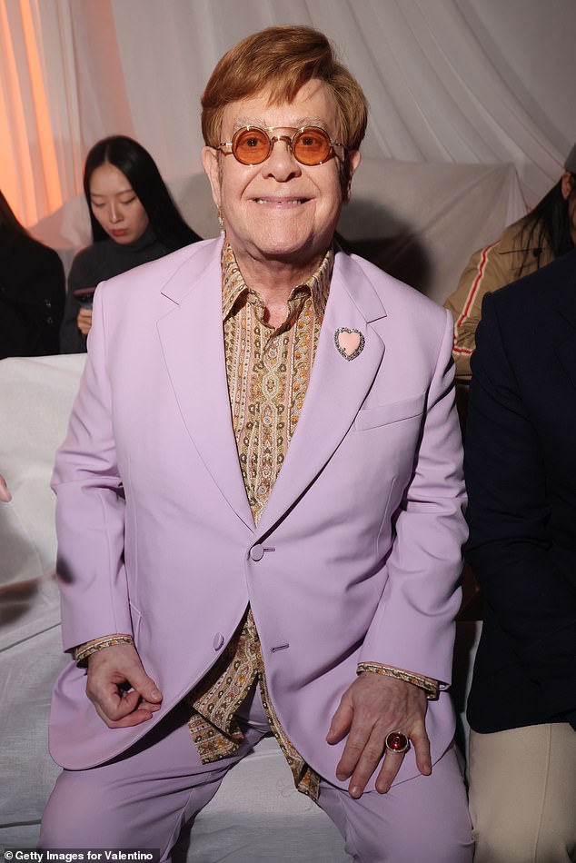 The singer wore a striking lilac suit