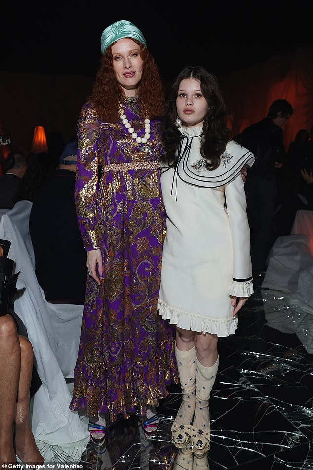 Model and singer Karen Elson wore a beautiful purple dress