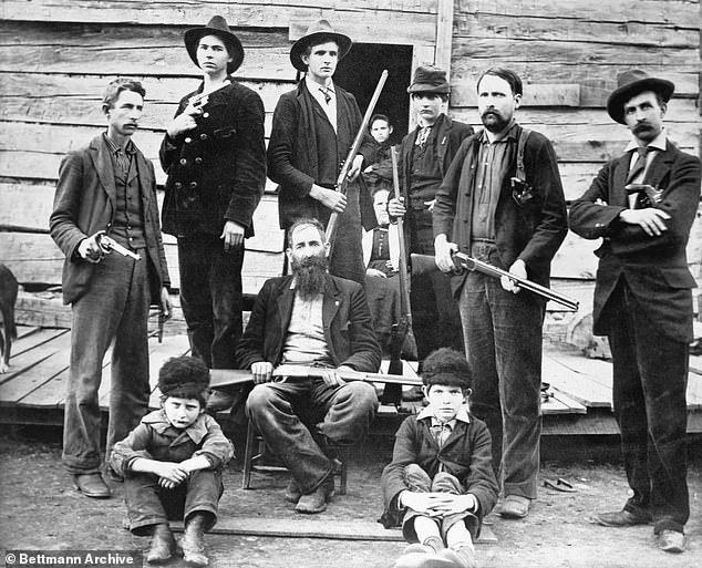 A group photo of the Hatfields circa 1899 in front of their West Virginia home