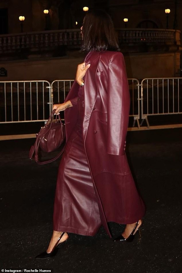 She paired the stunning ensemble with a pair of black slingback heels and a berry-colored bag as she walked the streets of Paris.