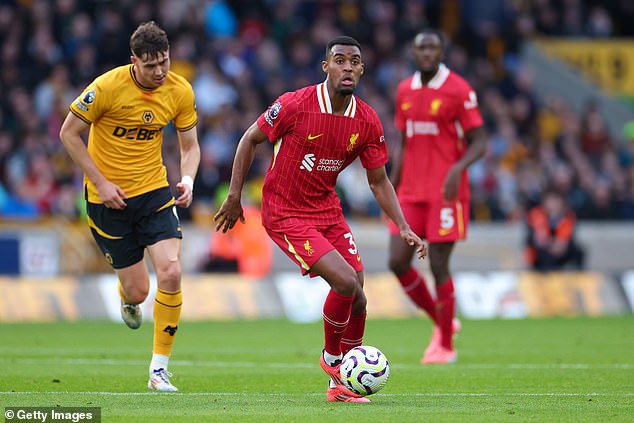 Ryan Gravenberch (center) played as a midfielder for Liverpool this season