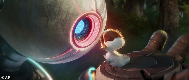 Roz, voiced by Oscar winner Lupita N'Yongo, and Brightbill, voiced by Kit Connor, are shown in a scene from DreamWorks Animation's film The Wild Robot