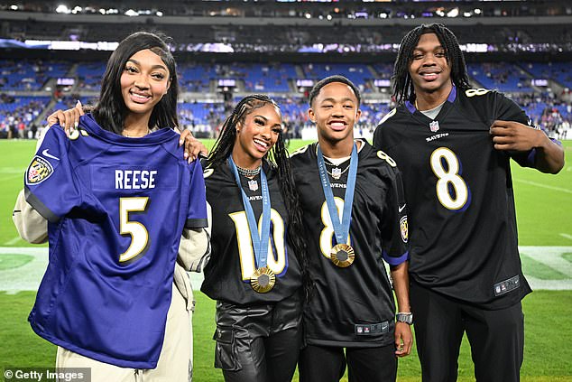 Reese poses with Masai Russell, Quincy Wilson and Carlton Carrington (left to right)