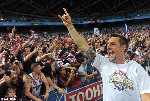 Pearce would go on to have a successful football career, including claiming the 2013 premiership with the Roosters (pictured)