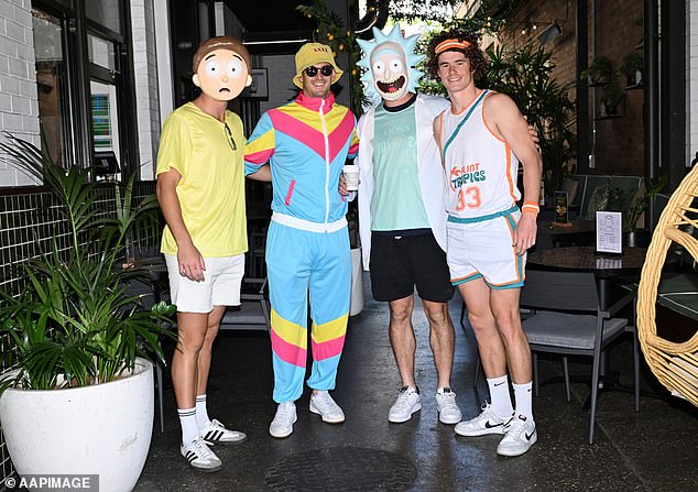 Players were decked out in a variety of hilarious costumes for the Mad Monday celebration, which featured cartoon characters Rick and Morty (left and second from right)