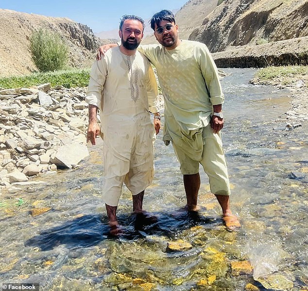 The group stopped at a watering hole to dip their feet in a stream