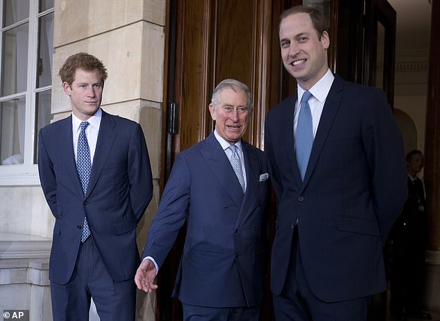 There have been questions about whether Prince Harry (left) would catch up with his father King Charles (centre) or brother Prince William (right) while in Britain - they are seen here together outside Lancaster House in central London in February 2014