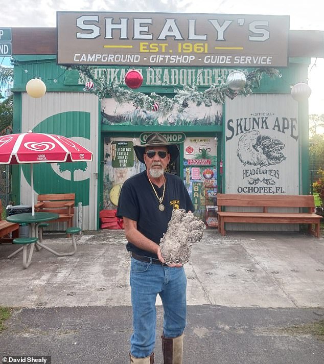 Shealy holds a plaster cast of what he believes to be a Skunk Ape footprint