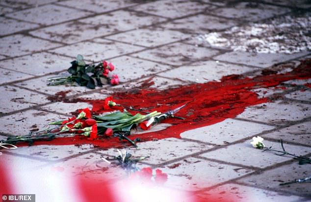 Flowers at the spot where Swedish Prime Minister Olof Palme was assassinated in March 1986