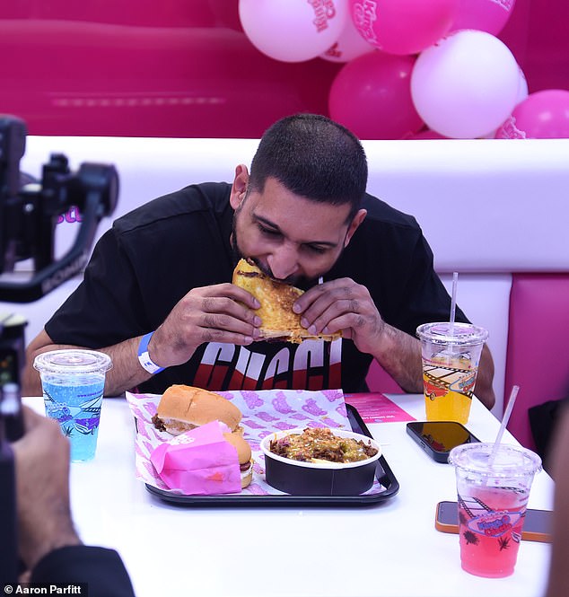 Amir gave the restaurant his seal of approval when he gave the restaurant a thumbs up after digging into the tasty sandwich