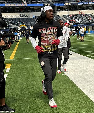 Rashee Rice wears a Travis Kelce t-shirt