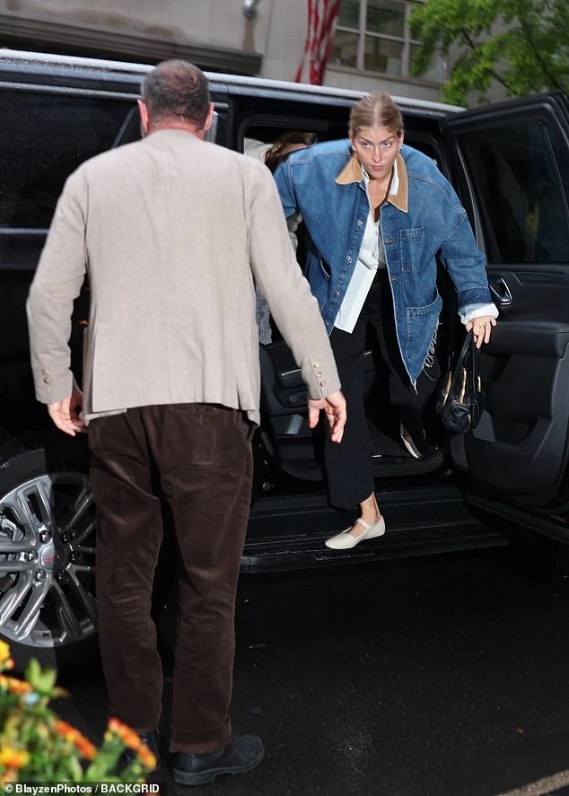 His wife of one year, Taylor, 32, rocked a denim jacket and pants as she walked into the upscale eatery