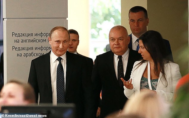 Kiselyov is the doyen of Putin propagandists, but is also the general head of Russia's largest state television empire, personally appointed by the dictator (pictured together)