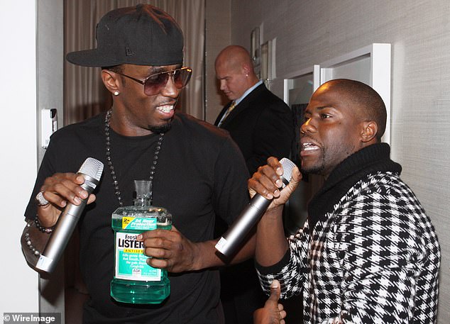 Sean 'Diddy' Combs and actor and comedian Kevin Hart attend the Diddy-Dirty Money album release party at The London Hotel on December 14, 2010 in New York City