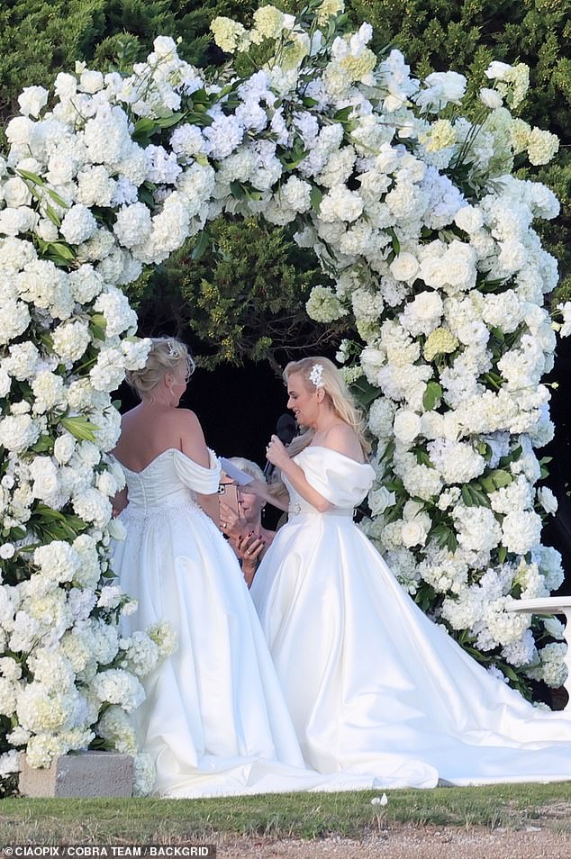 In photos from the big day, the newlyweds looked stunning in almost identical strapless wedding dresses with voluminous skirts