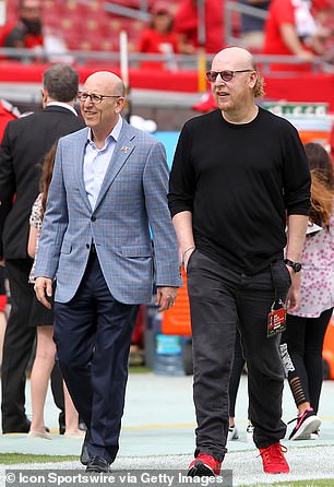 Joel Glazer, co-chairman of Buccaneers, and Avram Glazer, executive director of Manchester United