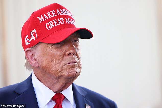 Republican presidential candidate, former US President Donald Trump, makes brief statements as he arrives at Valdosta Regional Airport to visit areas affected by Hurricane Helene on September 30, 2024 in Valdosta, Georgia