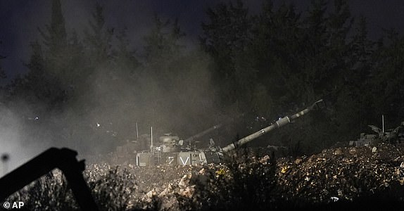 An Israeli mobile artillery unit fires a shell from northern Israel towards Lebanon, in a position near the Israel-Lebanon border, Monday, September 30, 2024. (AP Photo/Baz Ratner)