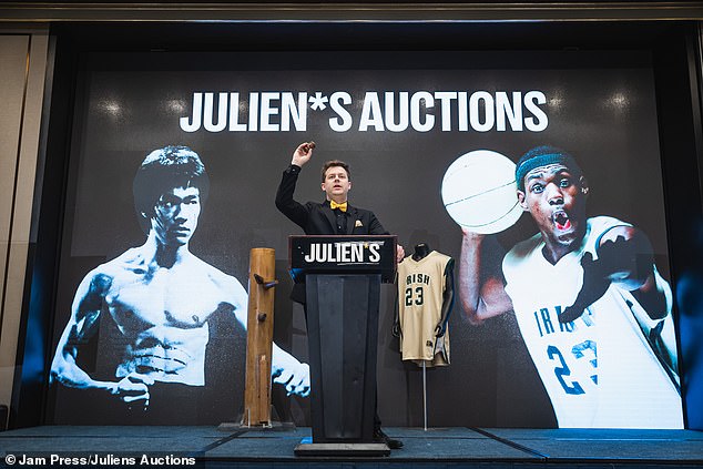 The sweater was the best-selling item at this special event auction in Hong Kong