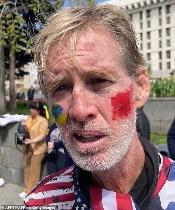 TOPSHOT - This September 16, 2024, screenshot from AFPTV shows Ryan Wesley Routh speaking during an interview at a rally to urge foreign leaders and international organizations to provide humanitarian corridors for the evacuation of civilians and Ukrainian servicemen from Mariupol in central Kiev on April 27, 2022, amid Russia's invasion of Ukraine. US media reported that it was Routh, 58, who was arrested after US Secret Service agents "opened fire on a gunman" with an AK-47-style rifle near the border of Donald Trump's golf course in Florida, where the former president was playing golf on September 15, 2024. (Photo by AFPTV / AFP) (Photo by -/AFPTV/AFP via Getty Images)