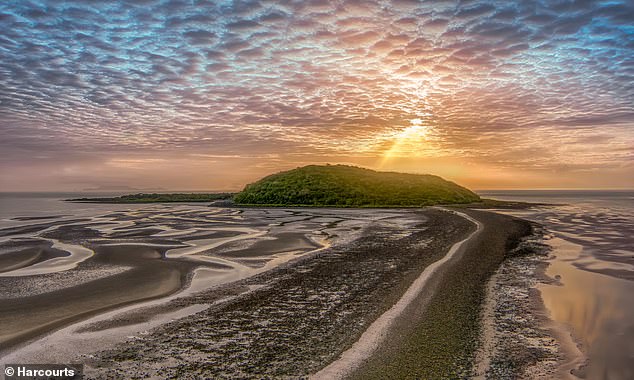 Little Green Island off the coast of Mackay in northern Queensland was sold at auction on Monday to a local family for $5.6 million