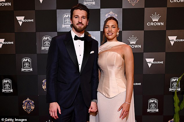 Amanda Dillon raised eyebrows after declaring: 'I would like to see Marcus Bontempelli [win the Brownlow]but I've been told he might not be in the mix' (pictured, Bontempelli at the medal table with partner Neila Brennan)