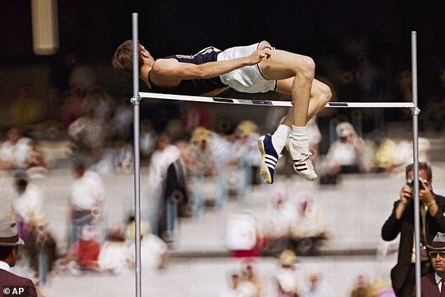 Dick Fosbury of the United States clears the bar in the high jump at the 1968 Olympic Games in Mexico City