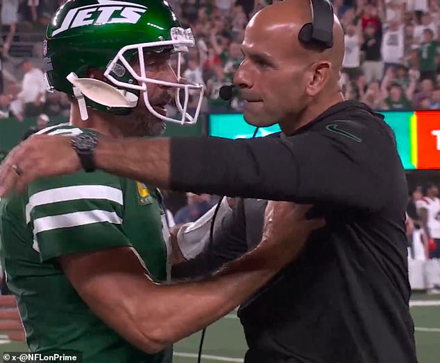 Aaron Rodgers and Robert Saleh had a seemingly tense moment during the Patriots game