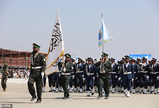 Taliban security personnel take part in a military parade to mark the third anniversary of the Taliban government's takeover, in Bagram, Afghanistan, August 14, 2024