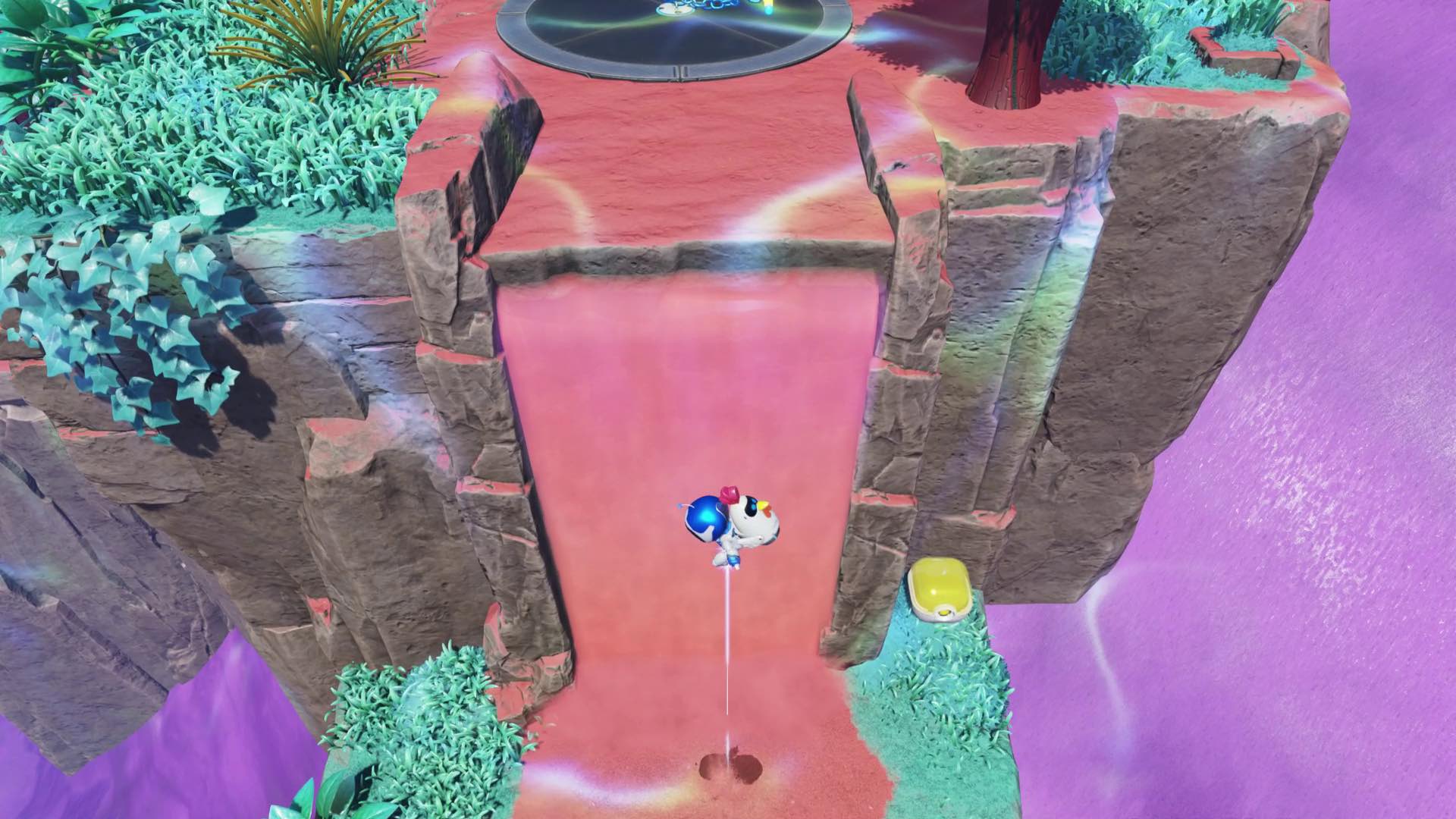 Astro Bot flies to a bot in a sand waterfall in Trapped In Time