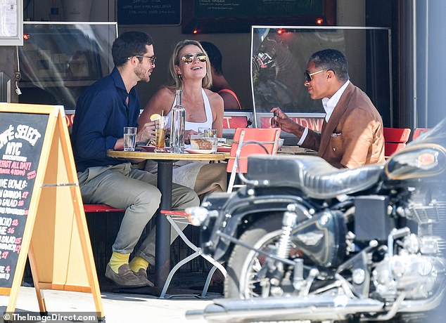 Amy Robach and TJ Holmes were photographed dining outside with Tyson Foods heir John R. Tyson in New York City earlier this week