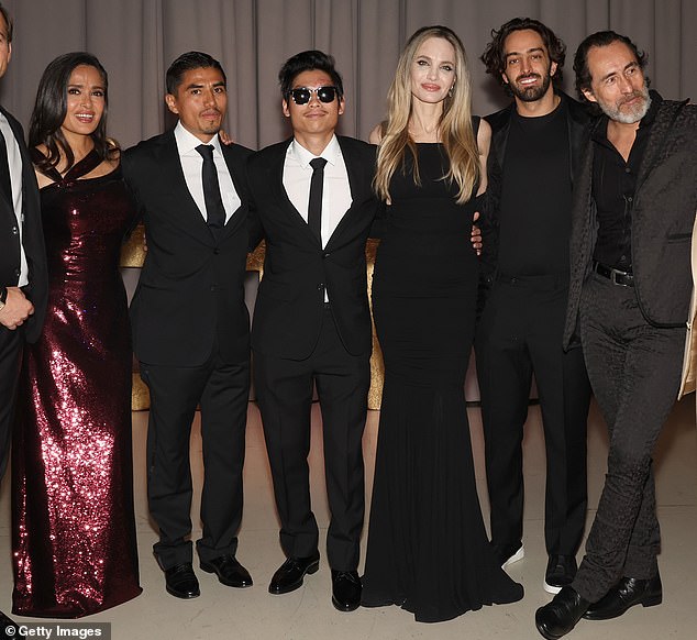 (L-R) Salma Hayek, Jorge Antonio Guerrero, Pax, Jolie, Patricio Jose, Demia¡n Bichir attend the premiere of Without Blood in Toronto