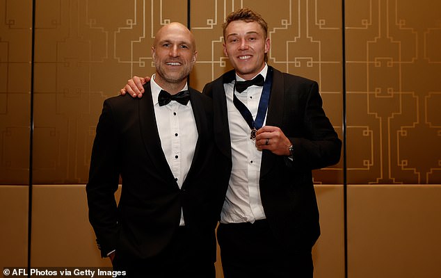 Cripps joined Carlton icon Chris Judd (left) as winners of two Brownlow Medals, but not all football fans believe the voting system was fair