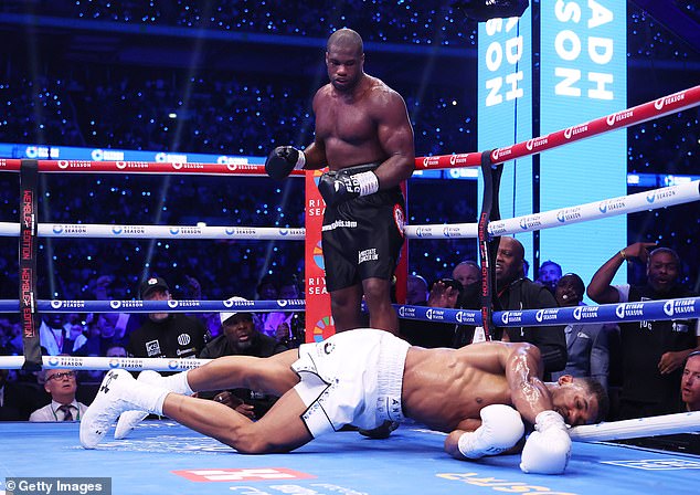 Anthony Joshua called Daniel Dubois 's***' just before being knocked out (pictured above) in front of 98,000 fans at Wembley Stadium