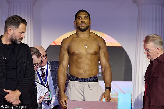 RIYADH, SAUDI ARABIA - MARCH 7: Anthony Joshua weighs in ahead of his 'Knockout Chaos' heavyweight bout against Francis Ngannou in Greece at Boulevard World on March 7, 2024 in Riyadh, Saudi Arabia. (Photo by Richard Pelham/Getty Images)