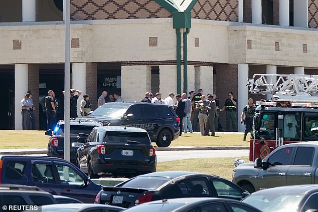 Concerned parents gathered at school on Wednesday