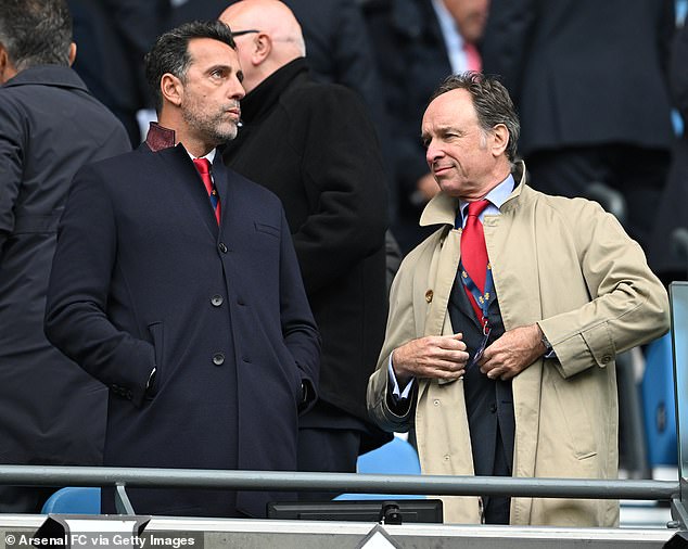 Arsenal director Tim Lewis (right) has reportedly stormed from his chair after refusing to shake hands with his Man City colleagues following the Gunners' draw