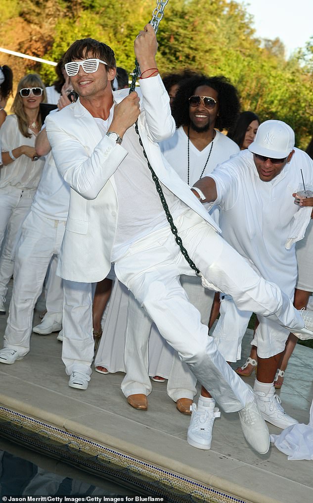 Ashton co-hosted with Combs a White Party to raise awareness for Malaria No More, held at a private residence in Beverly Hills on July 4, 2009.