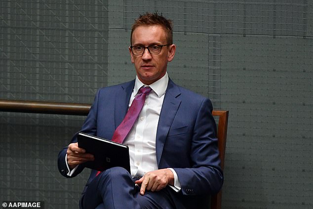 Julian Hill (pictured in Parliament) is the Assistant Minister for Citizenship and Multicultural Affairs