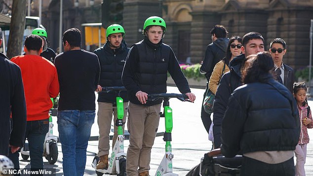 People riding e-scooters must always wear a helmet. Photo: NewsWire /Brendan Beckett