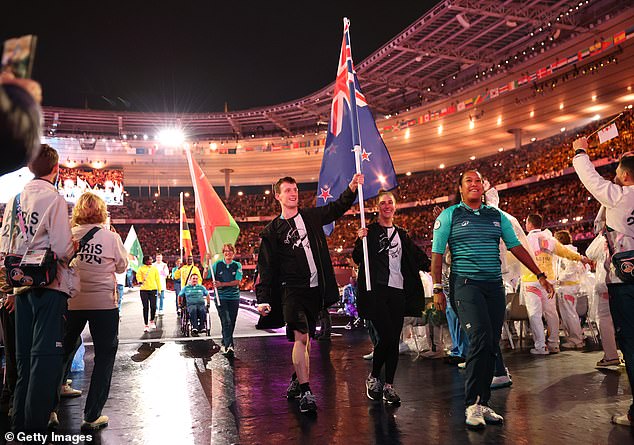 Australian flag bearers Lauren Parker and James Turner at the closing ceremony in Paris